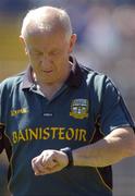 17 July 2005; Meath manager Sean Boylan checks his watch during the second half. Bank of Ireland All-Ireland Senior Football Championship Qualifier, Round 3, Meath v Cavan, St. Tighernach's Park, Clones, Co. Monaghan. Picture credit; Damien Eagers / SPORTSFILE