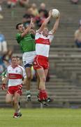 17 July 2005; Patsy Bradley, Derry, contests a high ball with John Galvin, Limerick. Bank of Ireland All-Ireland Senior Football Championship Qualifier, Round 3, Derry v Limerick, McHale Park, Castlebar, Co. Mayo. Picture credit; Pat Murphy / SPORTSFILE