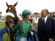 17 July 2005; Christophe Soumillon, jockey, with HRH the Aga Khan after winning the Darley Irish Oaks on Shawanda. Curragh Racecourse, Co. Kildare. Picture credit; Matt Browne / SPORTSFILE
