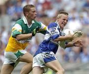 17 July 2005; Stephen O'Leary, Laois, in action against John Knight, Offaly. Leinster Minor Football Championship Final, Offaly v Laois, Croke Park, Dublin. Picture credit; Brian Lawless / SPORTSFILE
