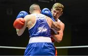 22 February 2014; Joe Fitzpatrick, right, Immaculata Boxing Club, exchanges punches with David Oliver Joyce, St. Michaels Boxing Club, during their 60kg bout. National Senior Boxing Championships, First Round, National Stadium, Dublin. Picture credit: Barry Cregg / SPORTSFILE