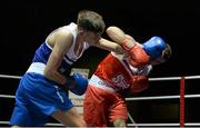 22 February 2014; Michael Nevin, left, Portlaoise Boxing Club, exchanges punches with Sean Duffy, Holy Trinity Boxing Club, during their 60kg bout. National Senior Boxing Championships, First Round, National Stadium, Dublin. Picture credit: Barry Cregg / SPORTSFILE