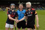 22 February 2014; Scoil na Trionoide Naofa captain Stephen Ryan, left, and Ard Scoil Ris captain Cian Lynch exchange a handshake in the company of referee John O'Brien before the game. Dr. Harty Cup Final, Scoil na Trionoide Naofa, Doon v Ard Scoil Ris, Limerick. Gaelic Grounds, Limerick. Picture credit: Diarmuid Greene / SPORTSFILE