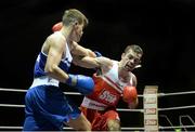 22 February 2014; Sean Duffy, right, Holy Trinity Boxing Club, exchanges punches with Michael Nevin, Portlaoise Boxing Club, during their 60kg bout. National Senior Boxing Championships, First Round, National Stadium, Dublin. Picture credit: Barry Cregg / SPORTSFILE