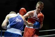 22 February 2014; Ciaran Bates, right, St. Mary's Boxing Club, exchanges punches with Dean Walsh, St.Joseph's/Ibars Boxing Club, during their 64kg bout. National Senior Boxing Championships, First Round, National Stadium, Dublin. Picture credit: Barry Cregg / SPORTSFILE
