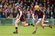 22 February 2014; Michael Casey, Ard Scoil Ris, in action against Dean Coleman, Scoil na Trionoide Naofa. Dr. Harty Cup Final, Scoil na Trionoide Naofa, Doon v Ard Scoil Ris, Limerick. Gaelic Grounds, Limerick. Picture credit: Diarmuid Greene / SPORTSFILE