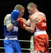 22 February 2014; Ciaran Bates, right, St. Mary's Boxing Club, exchanges punches with Dean Walsh, St.Joseph's/Ibars Boxing Club, during their 64kg bout. National Senior Boxing Championships, First Round, National Stadium, Dublin. Picture credit: Barry Cregg / SPORTSFILE
