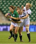 22 February 2014; Lynne Cantwell, Ireland, is tackled by Lydia Thompson, centre, and Marlie Packer, England. RBS Women's Six Nations Rugby Championship 2014, England v Ireland. Twickenham Stadium, Twickenham, London, England. Picture credit: Brendan Moran / SPORTSFILE
