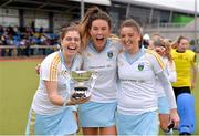 23 February 2014; UCD players, from left, Katie Mullan, Nikki Evans and Gill Pinder celebrate with the cup after the game. Irish Women's Senior Cup Final, UCD v Pembroke Wanderers, National Hockey Stadium, UCD, Belfield, Dublin. Picture credit: Brendan Moran / SPORTSFILE
