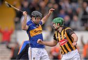 23 February 2014; Mark Kelly, Kilkenny, celebrates after scoring his side's fifth goal of the game as Tipperary's Conor O'Brien shows his disappointment. Allianz Hurling League, Division 1A, Round 2, Kilkenny v Tipperary, Nowlan Park, Kilkenny. Picture credit: Pat Murphy / SPORTSFILE
