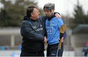 23 February 2014; Alan McCrabbe, Dublin, is greeted by Dublin team doctor Dr. Chris Thompson after being substituted late in the game. Allianz Hurling League, Division 1A, Round 2, Dublin v Clare, Parnell Park, Dublin. Picture credit: Stephen McCarthy / SPORTSFILE