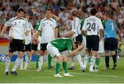 2 September 2006; Republic of Ireland captain Robbie Keane holds his head after a chance goes wide during the closing stages of the game. Euro 2008 Championship Qualifier, Germany v Republic of Ireland, Gottleib-Damlier Stadion, Stuttgart, Germany. Picture credit: David Maher / SPORTSFILE