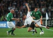 13 October 2007; Mario Gomez, Germany, in action against Stephen Kelly and Lee Carsley, left, Republic of Ireland. 2008 European Championship Qualifier, Republic of Ireland v Germany, Croke Park, Dublin. Picture credit; Pat Murphy / SPORTSFILE