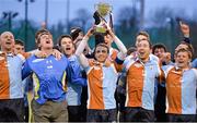 23 February 2014; The Three Rock Rovers team, led by captain Mitch Darling, celebrate with the cup after the game. Irish Men's Senior Cup Final, Pembroke Wanderers v Three Rock Rovers, National Hockey Stadium, UCD, Belfield, Dublin. Picture credit: Brendan Moran / SPORTSFILE