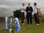 15 July 2005; Longford Town manager Alan Mathews, centre, in conversation with Derry City players Stephen O'Flynn, left, and Eddie McCallion, after they were drawn against each other. The 2005 eircom League Cup Semi-Final Draw. Porterhouse North, Glasnevin, Dublin. Picture credit; Brian Lawless / SPORTSFILE