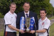 15 July 2005; Longford Town manager Alan Mathews, centre, with Derry City players Stephen O'Flynn, left, and Eddie McCallion, after they were drawn against each-other. The 2005 eircom League Cup Semi-Final Draw. Porterhouse North, Glasnevin, Dublin. Picture credit; Brian Lawless / SPORTSFILE