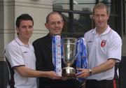 15 July 2005; Padraig Corkery, eircom Head of Sponsorship, with Derry City players Stephen O'Flynn, right, and Eddie McCallion, after they were drawn against Longford Town. The 2005 eircom League Cup Semi-Final Draw. Porterhouse North, Glasnevin, Dublin. Picture credit; Brian Lawless / SPORTSFILE