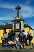 6 August 2004; Oulart-the-Ballagh men who won All-Ireland titles for Wexford pictured in front of the 1798 Rebellion Monument. Back row, from left, Rory Jacob, Paul Finn, Keith Rossiter, Martin Storey, Mick Jacob, Tom Byrne, Tomas Dunne and Michael Jacob. Front, from left, Darren Stamp, Liam Dunne, Christy Jacob, Sean Dunne and Jimmy Prendergast. Oulart-the-Ballagh, Co. Wexford. Picture credit; Brendan Moran / SPORTSFILE