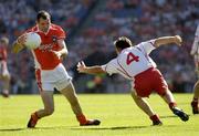 10 July 2005; Steven McDonnell, Armagh, in action against Shane Sweeney, Tyrone. Bank of Ireland Ulster Senior Football Championship Final, Armagh v Tyrone, Croke Park, Dublin. Picture credit; Ray McManus / SPORTSFILE