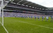 17 July 2005; The Dublin and Laois teams march in front of the Cusack Stand in the pre-match parade. Bank of Ireland Leinster Senior Football Championship Final, Dublin v Laois, Croke Park, Dublin. Picture credit; Ciara Lyster / SPORTSFILE