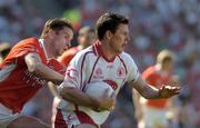 10 July 2005; Mark Harte, Tyrone, in action against Paul McGrane, Armagh. Bank of Ireland Ulster Senior Football Championship Final, Armagh v Tyrone, Croke Park, Dublin. Picture credit; Ciara Lyster / SPORTSFILE