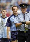 17 July 2005; Dublin captain Paddy Christie, centre, and goalkeeper Stephen Cluxton, left, are led in the pre-match parade by the Band of An Garda Siochana. Bank of Ireland Leinster Senior Football Championship Final, Dublin v Laois, Croke Park, Dublin. Picture credit; Brian Lawless / SPORTSFILE