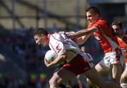 10 July 2005; Sean Cavanagh, Tyrone, in action against Philip Loughran, Armagh. Bank of Ireland Ulster Senior Football Championship Final, Armagh v Tyrone, Croke Park, Dublin. Picture credit; Ciara Lyster / SPORTSFILE