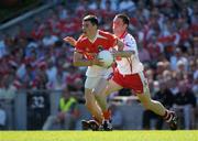 10 July 2005; Andy Mallon, Armagh, in action against Martin Penrose, Tyrone. Bank of Ireland Ulster Senior Football Championship Final, Armagh v Tyrone, Croke Park, Dublin. Picture credit; Ray McManus / SPORTSFILE