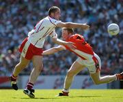 10 July 2005; Stephen O'Neill, Tyrone, in action against Francie Bellew, Armagh. Bank of Ireland Ulster Senior Football Championship Final, Armagh v Tyrone, Croke Park, Dublin. Picture credit; Ray McManus / SPORTSFILE