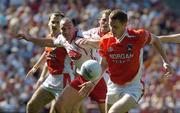 10 July 2005; Tony McEntee, Armagh, in action against Brian Dooher, Tyrone. Bank of Ireland Ulster Senior Football Championship Final, Armagh v Tyrone, Croke Park, Dublin. Picture credit; Ray McManus / SPORTSFILE