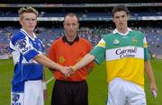 17 July 2005; Laois captain Richard Ryan shakes hands with Offaly captain Richard Dalton in the company of referee Cormac Reilly. Leinster Minor Football Championship Final, Offaly v Laois, Croke Park, Dublin. Picture credit; Brian Lawless / SPORTSFILE