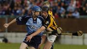 20 July 2005; Peadar Carton, Dublin, in action against Kilkenny's Sean Cummins. Leinster U21 Hurling Championship Final, Kilkenny v Dublin, Dr. Cullen Park, Carlow. Picture credit; Pat Murphy / SPORTSFILE