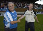 20 July 2005; The Kilkenny manager Adrian Finan, right, is congratulated by Dublin manager Sean Lane. Leinster U21 Hurling Championship Final, Kilkenny v Dublin, Dr. Cullen Park, Carlow. Picture credit; Pat Murphy / SPORTSFILE