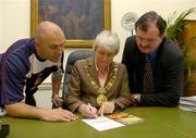 21 July 2005; Lord Mayor of Dublin Cllr Catherine Byrne pictured with  St. Patrick's Athletic Manager John McDonnell,left, and Chief Executive Bernard O'Byrne at the launch of a new initiave by St. Patrick's Athletic aimed at their fans. The Supporter Patron Scheme gives fans a space on the Stadium Grid, a unique Polo Shirt, exclusive invitation to a quarterly meeting and entry into a monthly draw. Mansion House, Dublin. Picture credit; Matt Browne / SPORTSFILE