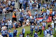 17 July 2005; Patrons make their way onto the pitch from Hill 16 to celebrate Dublin's victory over Laois. Bank of Ireland Leinster Senior Football Championship Final, Dublin v Laois, Croke Park, Dublin. Picture credit; Ray McManus / SPORTSFILE