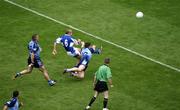 17 July 2005; Colin Moran, Dublin, attempts to block the shot from Tom Kelly, Laois. The shot went wide. Bank of Ireland Leinster Senior Football Championship Final, Dublin v Laois, Croke Park, Dublin. Picture credit; Ray McManus / SPORTSFILE