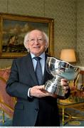 25 February 2014; Uachtarán na hÉireann Michael D. Higgins with the President's Cup. Aras an Uachtarain, Phoenix Park, Dublin. Picture credit: David Maher / SPORTSFILE