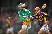 23 February 2014; Damien Kilmartin, Offaly, in action against Paul Morris, Wexford. Allianz Hurling League Division 1B Round 2, Wexford v Offaly, O'Kennedy Park, New Ross, Co. Wexford. Picture credit: Matt Browne / SPORTSFILE
