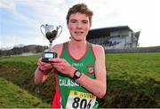 25 February 2014; James Fallon, Calasanctius Oranamore, Galway, with the trophy after winning the Senior Boys 6000m race during the Aviva Connacht Schools Cross Country Championships. Sligo Race Course, Sligo. Picture credit: Barry Cregg / SPORTSFILE