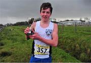 25 February 2014; Aaron Doherty, Rice College Westport, Co. Mayo, with the trophy after winning the Junior Boys 3000m race during the Aviva Connacht Schools Cross Country Championships. Sligo Race Course, Sligo. Picture credit: Barry Cregg / SPORTSFILE