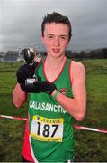 25 February 2014; Oisín Lyons, Calasanctius Oranmore, Galway, with the trophy after winning the Junior Boys 3000m race during the Aviva Connacht Schools Cross Country Championships. Sligo Race Course, Sligo. Picture credit: Barry Cregg / SPORTSFILE