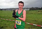 25 February 2014; Oisín Lyons, Calasanctius Oranmore, Galway, with the trophy after winning the Junior Boys 3000m race during the Aviva Connacht Schools Cross Country Championships. Sligo Race Course, Sligo. Picture credit: Barry Cregg / SPORTSFILE