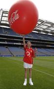 19 July 2005; Coca-Cola today celebrated their long-standing association with Féile na nGael, by offering fans the chance to have bottles of Coke sleeved with the colours of their favourite GAA county team while attending games in Croke Park during July, August and September. At the photocall is Cork supporter Ciara O'Riordan. Croke Park, Dublin. Picture credit; Ray McManus / SPORTSFILE