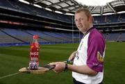 19 July 2005; Coca-Cola today celebrated their long-standing association with Féile na nGael, by offering fans the chance to have bottles of Coke sleeved with the colours of their favourite GAA county team while attending games in Croke Park during July, August and September. At the photocall is Damien Fitzhenry, the Wexford goalkeeper. Croke Park, Dublin. Picture credit; Ray McManus / SPORTSFILE