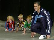 19 July 2005; Westmeath footballer Dessie Dolan with Hannah Walsh, age 3, from Swords, Jack Ryan, Kilkenny jersey, age 3, from Kilkenny, and John Mitchell, age 6, from Meath, at the announcement that Ireland's 8th National Coaching Forum, which is coordinated by the National Coaching and Training Centre (NCTC), in association with Lucozade Sport, will take place in Limerick from 2-4 September. Kildare Street, Dublin. Picture credit; Ciara Lyster / SPORTSFILE