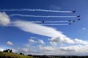 20 July 2005; Seven of the nine pilots, in their race planes, on their arrival at the Rock of Cashel, Co. Tipperary, in preparation for this weekend's Red Bull Air Race World Series. Cashel, Co. Tipperary. Picture credit; Brendan Moran / SPORTSFILE