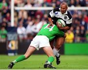 28 May 2000; Jonah Lomu, Barbarians, is tackled by Shane Horgan, Ireland. Ireland v Barbarians, Rugby Friendly, Lansdowne Road, Dublin. Picture credit: Aoife Rice / SPORTSFILE