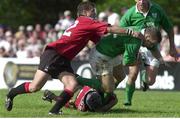 17 June 2000; Kevin Maggs, Ireland, is tackled by Mark Irvine, (12), and Scott Stewart, Canada. Rugby International, Canada v Ireland,  Fletcher's Fields, Ontario, Canada. Picture credit: Matt Browne / SPORTSFILE