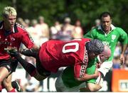 17 June 2000; Keith Wood, Ireland, is tackled by Scott Stewart, Canada. Rugby International, Canada v Ireland,  Fletcher's Fields, Ontario, Canada. Picture credit: Matt Browne / SPORTSFILE