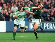 19 November 2000; Brian O'Driscoll, Ireland, in action against Robbie Fleck, South Africa. International friendly, Ireland v South Africa, Lansdowne Road, Dublin. Picture credit: Ray Lohan / SPORTSFILE